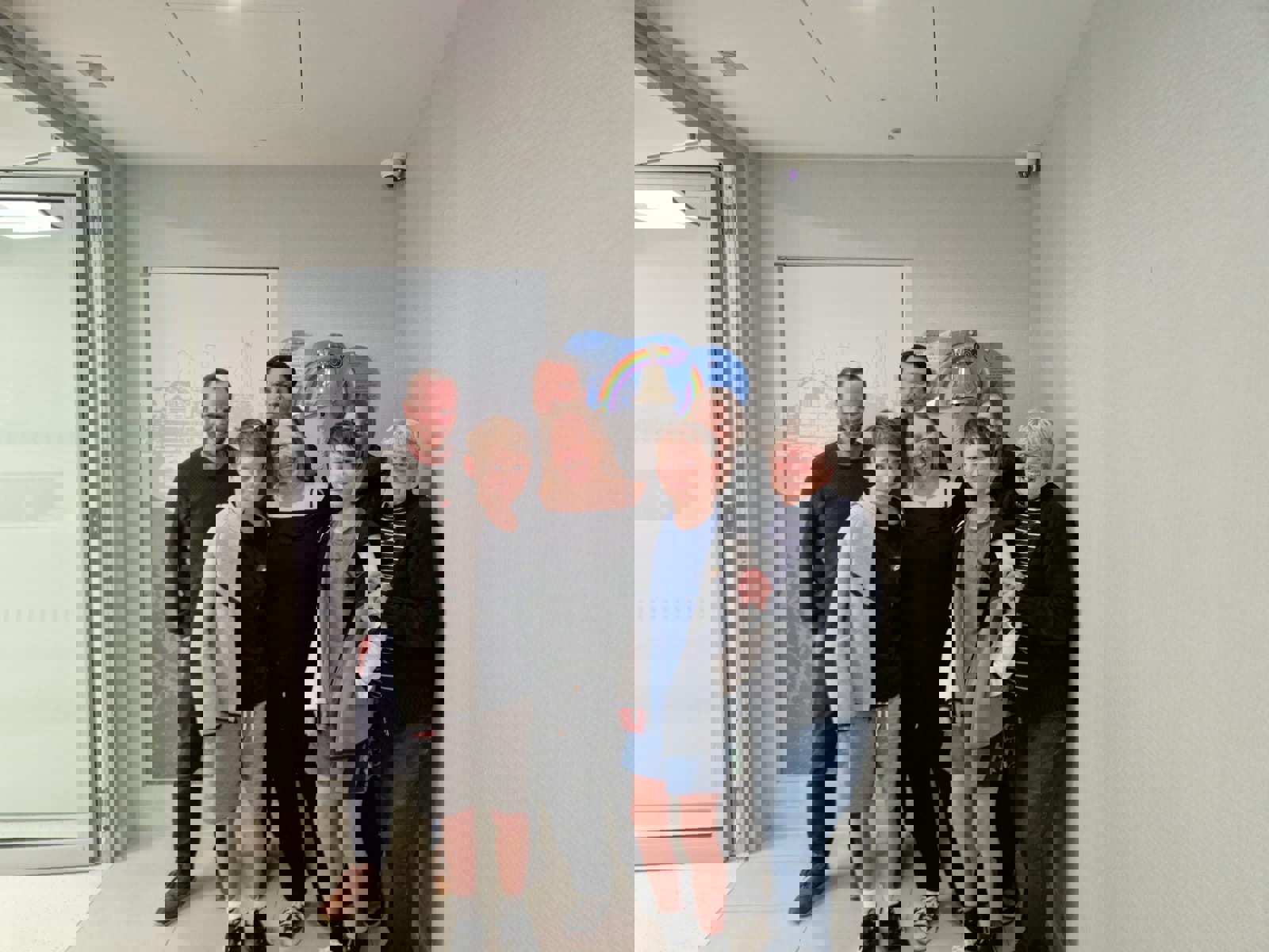 Katherine and her family after ringing the bell