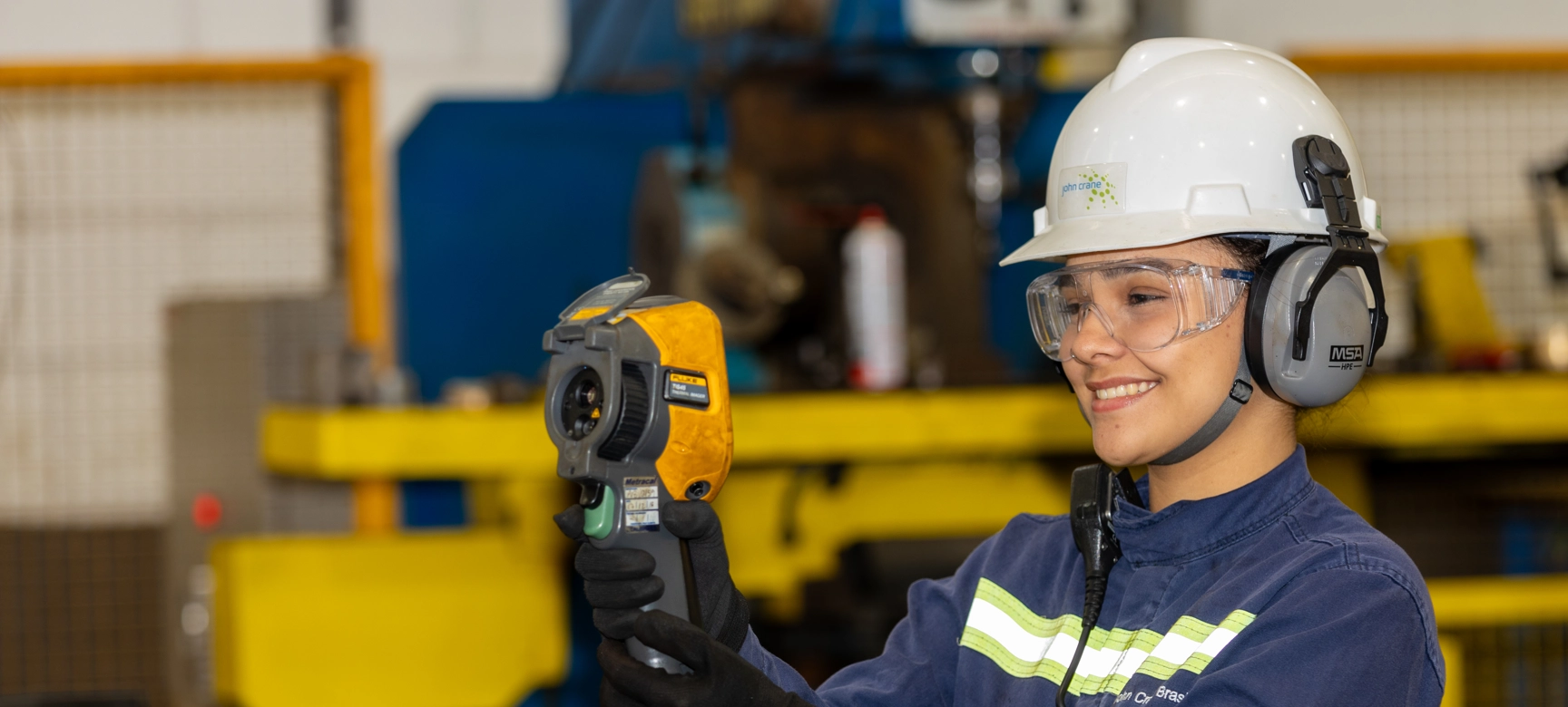 John Crane Employee Smiling While Working