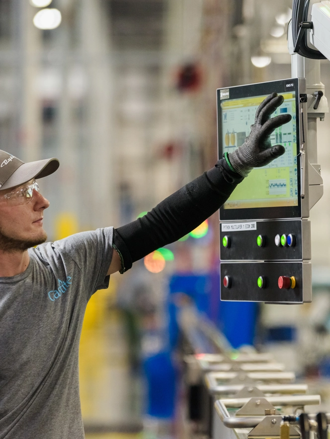 Employee Using Machine