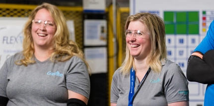 Two Females Smiling With Goggles