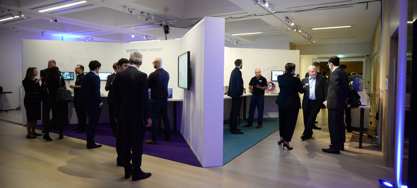 People Talking At Capital Market Event Stands