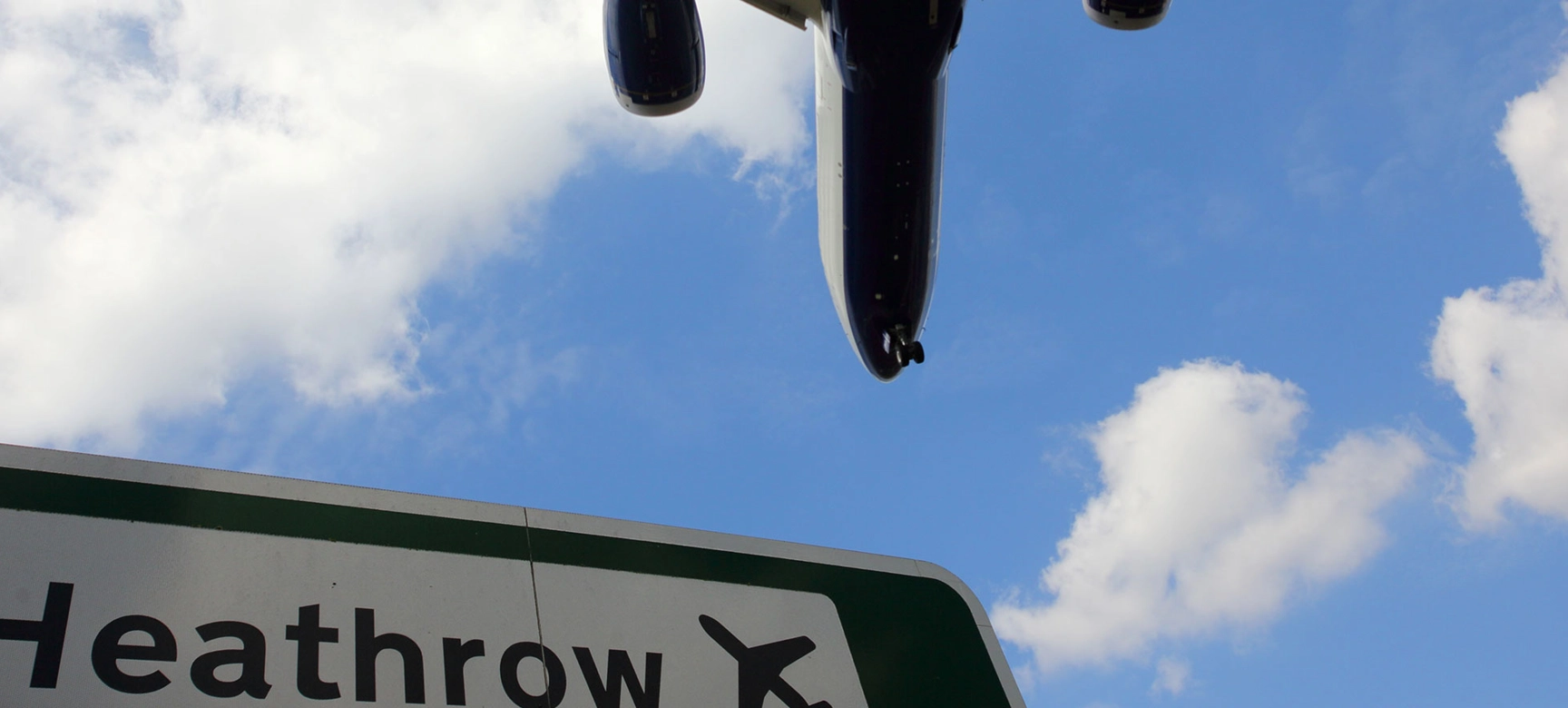Heathrow airport sign and plane