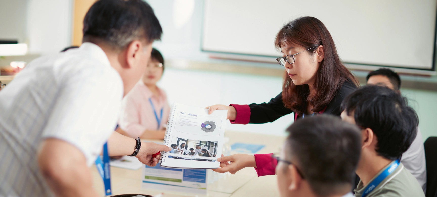 Engineering Explained Colleagues Showing Document